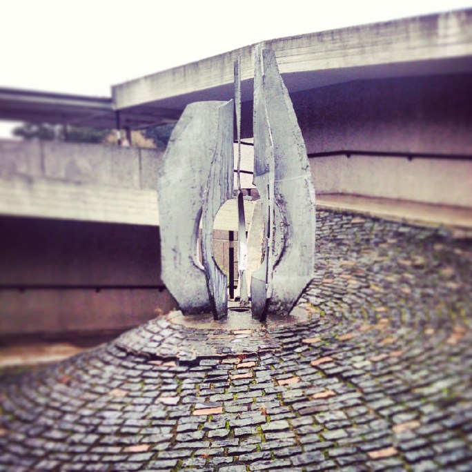 Untitled by Austin Wright (1967), in the middle of the ramp leading to the library