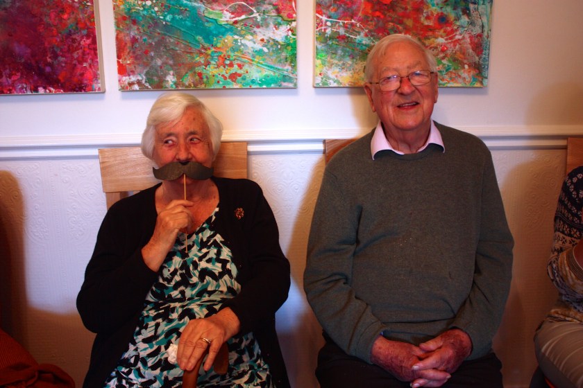 My Granny and Grandpa - Granny making the most of the moustaches that I made for the party!