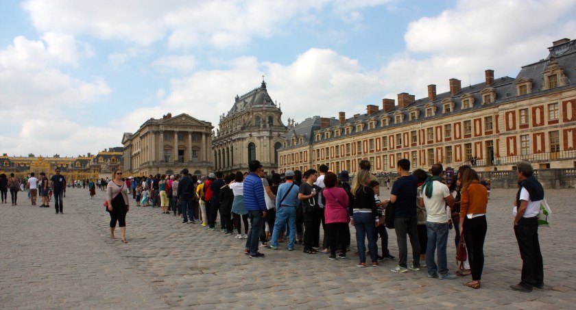 The huge queue to get into the Palace of Versailles