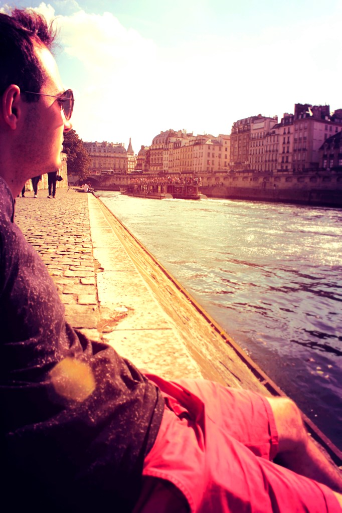 Malek enjoying the sun and Seine.